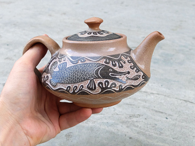 Teapot with pike arcticceramics arcticceramics ceramics fish graph handmade pottery relief teapot