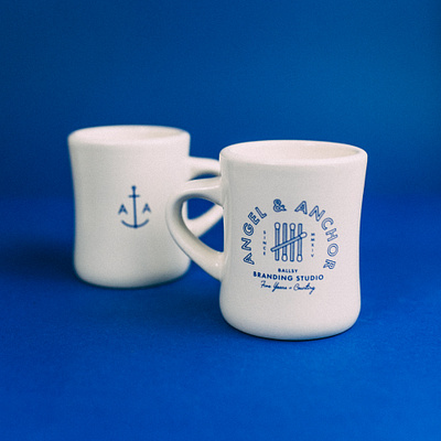 Angel & Anchor Limited Edition Diner Mug agency anchor branding diner mug for sale graphic design layout matches merch mug royal blue seal typography