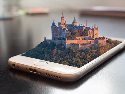 Castle on the mobile phone architecture building camera castle europe hand holding landscape medieval mobile old phone smart smartphone summer technology travel view woman young