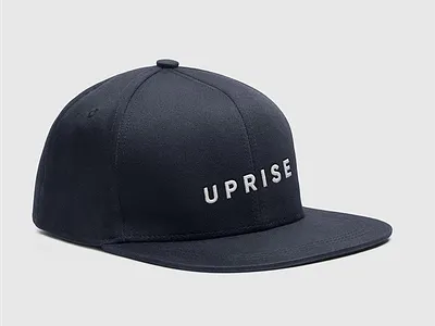 Uprise Logo on a Snapback branding cap design logo minimalism minimalist minimalist design minimalist logo promotional promotional design stationery typography vector