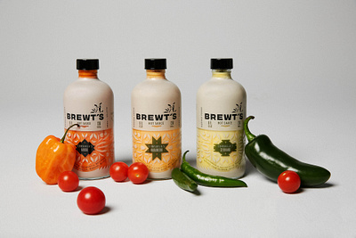 BREWT'S Hot Sauces art direction bottle branding chihuahua design dog dog logo food full circle hispanic hot sauce logo logo design packaging packaging design pattern peppers rebrand spicy