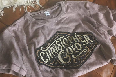 Christopher Gold Screen Printed Tee badge band band apparel crest crest logo hand lettering logo music musician rustic screen printing t shirt t shirt design tee vintage badge vintage tee western