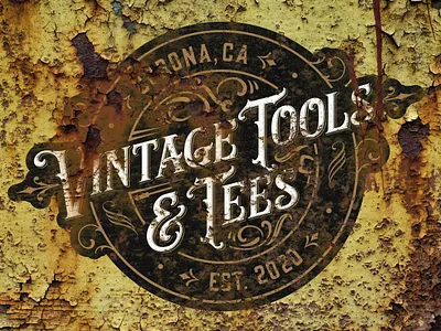 Vintage Tools & Tees logo on rusty panel branding decay design font logo painting rust typography vintage vintage logo weathered yellow