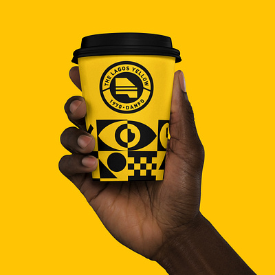 Hand Holding Coffee Cup Mockup - The Lagos Yellow badge branding design lagos logo logomark mockup monogram typography