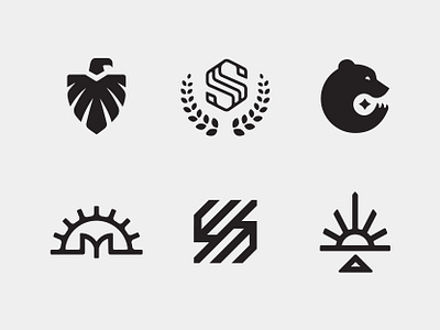 LogoLounge 12 animal arrowhead badge bear bird claw cog eagle feathers gear laurel linework logo logomark mark monogram s star sun