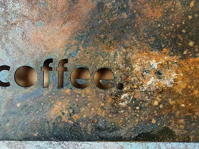 Coffee abstract artsy contrast cosmic design lasercut lettering lettering logo patina space typography