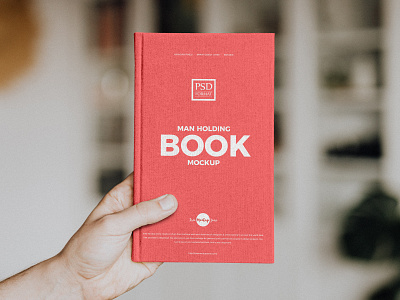 Free Man Holding Book Mockup book book design book mockup books mockup branding download free free mockup freebie identity logo mock up mockup mockup free mockup psd mockups print psd stationery template