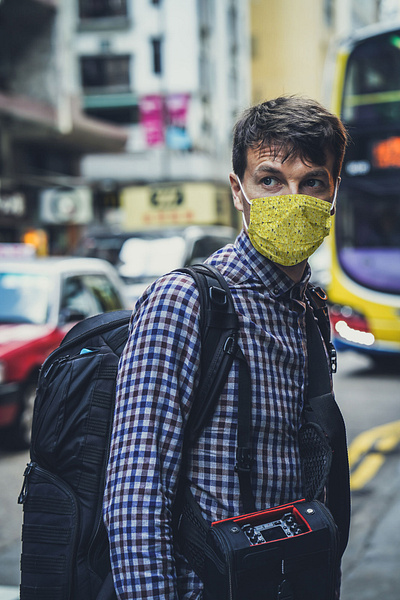 Man in Face Mask in City [Free PSD Mockup] audio equipment download face file free free download free mockup free psd freebie mask medical mock up mockup photoshop psd