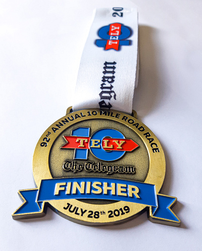 Tely 10 - Medal Design athletics design graphic design marathon medal medallions medals newfoundland race run running triathlete