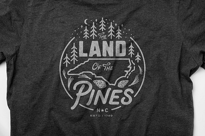 Land of the Pines Badge Design badge branding hand lettered handlettering illustration logo map nc north carolina pine pine tree sticker t shirt typography