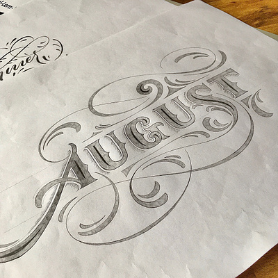 August flourishes lettering