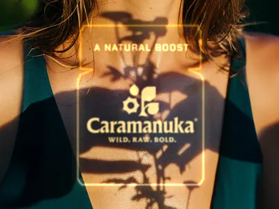 Caramanuka - A Natural Boost brand branding design flower flowers girl graphic design honey identity logo logo design logotype manuka natural product shadow sunset symbol