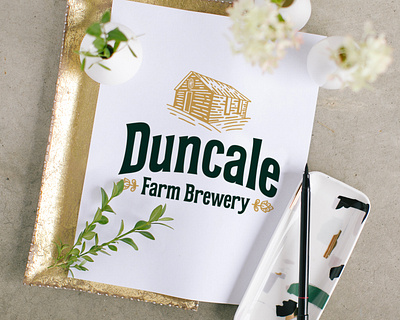 Duncale Farm Brewery beer brand brand identity cabin farm handlettering illustration lettering logo logo identity type typography wagon wheel