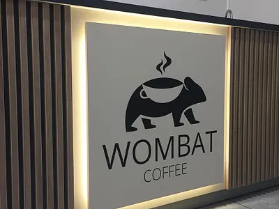 Logo for the coffee house "Wombat" black coffee coffee shop coffeehouse design designer illustration logo logodesign minimalism tea vector wombat