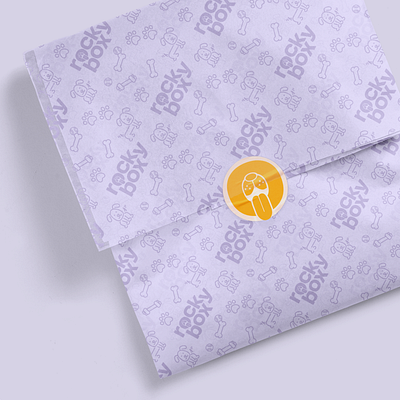 Branded wrapping paper brand identity branded branding branding and identity dog dog logo most most studios pattern pet rockybox service sticker wrapp wrapping paper