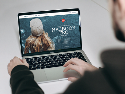 Free Person Working on MacBook Pro Mockup branding download free free mockup freebie identity macbook pro mock up mockup mockup free mockup psd mockups print psd stationery template ui design ui ux website mockup