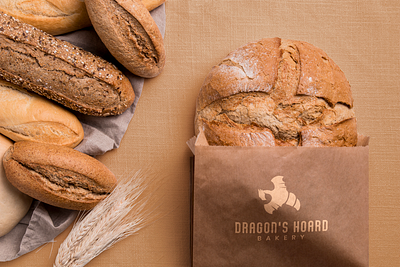 Dragon's Hoard Bakery Basic Packaging bakery bakery logo bakery packaging brand identity branding and identity company logo creative dragon logo design package design packagedesign packaging design