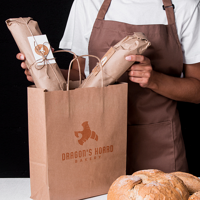 Dragon's Hoard Branding Elements bakery bakery packaging brand identity branding and identity branding design company logo creative croissant design dragon dragon logo logo logo design modern logo stationery design