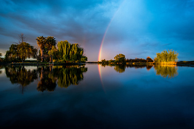 Calm during the Storm calm calming lake morning rainbow reflection storm