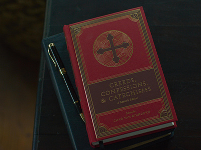 Creeds, Confessions, & Catechisms anthology book catechisms christian church confessions cover creeds cross design gold icon illustration jerusalem cross ornament red