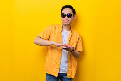 Asian man with cash of money asian man casual cheerful confident fashion guy handsome indonesia male money people person photography portrait stock photos summer young