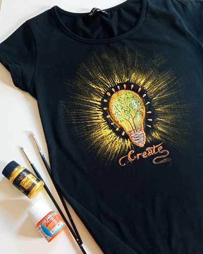 Hand-painted T-shirt, light bulb, gold effect and suede apparel branding design fashion hand painted handmade painting style wear