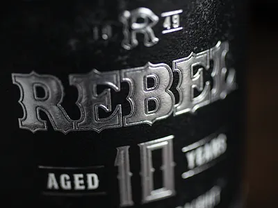 Rebel 10 Year bottle design label logo packaging spirits whiskey