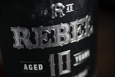 Rebel 10 Year bottle design label logo packaging spirits whiskey