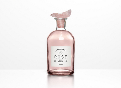 Rose Skin Tonic Branding and Packaging Design bottle branding design glass label organic packaging pink quartz rose scent skin stopper toner typography