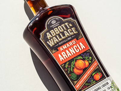 Abbott & Wallace Distilling abbott and wallace amaro bourbon brand design branding identity distillery distillery packaging distilling brand gin handcrafted herbs and spices kroneberger label design lettering logo design oranges packaging small batch whiskey