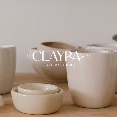 Clayra Pottery Studio brand design brand identity brand logo brand mark branding branding logo elegant logo graphic design illustrator logo logo design neutral logo online store online store logo photoshop pottery brand pottery logo web design workshop logo