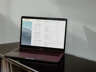 Website for Omnia 2 International design digital digital design graphic design grid identity laptop layout logo type typography ui uiux web web design website