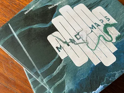 An actual photo of some actual CDs I designed compact disc cover art design graphic design logo music package design sleeve typography vector