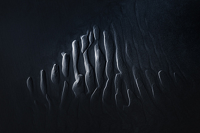 Dark Ripples black sand beach