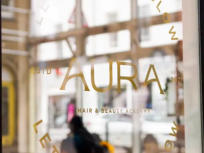 Aura hair & beauty academy window graphics academy beauty brand branding cling design display gold graphic design hair identity logo reflections salon shop sign writing signage typography window