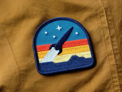 DKNG Rocketeer Series dan kuhlken design dkng dkng studios galaxy geometric illustration moon nathan goldman patch pin planet poster rocket rocketeer space stars vector