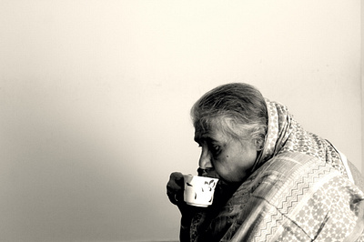 contemplation over chai monochrome photography