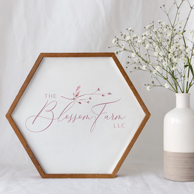 The Blossom Farm graphic design logo m