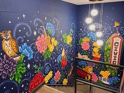 First half of stairwell mural animals design floral handlettering illustration lettering mural owl peacock stairwell vintage wedding