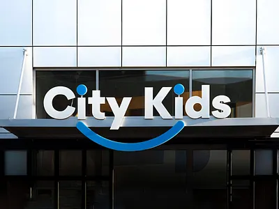 City Kids Exterior and Interior Signage branding brooklyn education exterior graphic design interior joyful learning centre logo playful preschool school signage smile smiley wayfinding