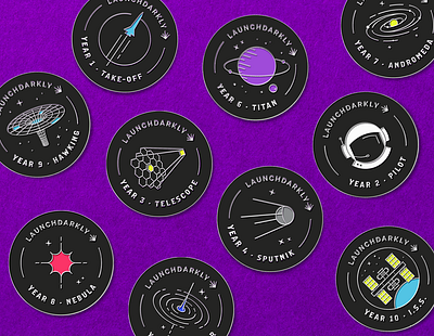 Anniversary enamel pins andromeda annivesary astronaut black hole branding design enamel pins graphic design illustration illustrator iss launchdarkly logo pins rocket space typography vector years