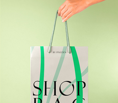 Free Hand Holding Paper Bag Psd Mockup psd bag mockup shopping bag mockup