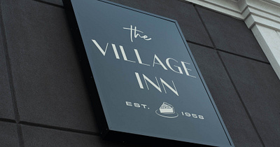 The Village Inn Signage