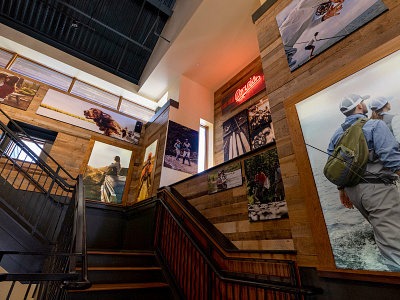 Orvis Flagship Stairwell Renovation branding fly fishing graphic design neon sign orvis retail design store design store renovation