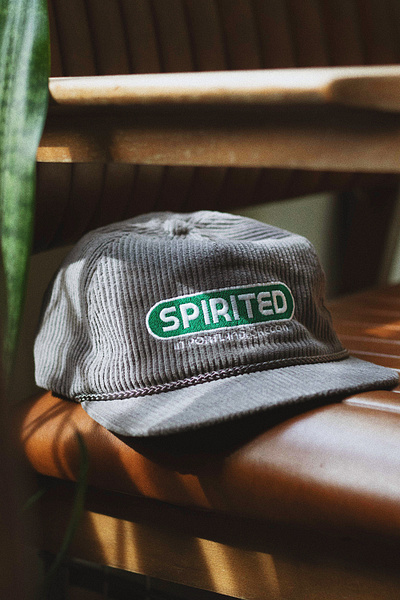 Spirited Cap 02 badge brand branding design embroidery green hat hat design illustration logo portland oregon spirited texture type vector