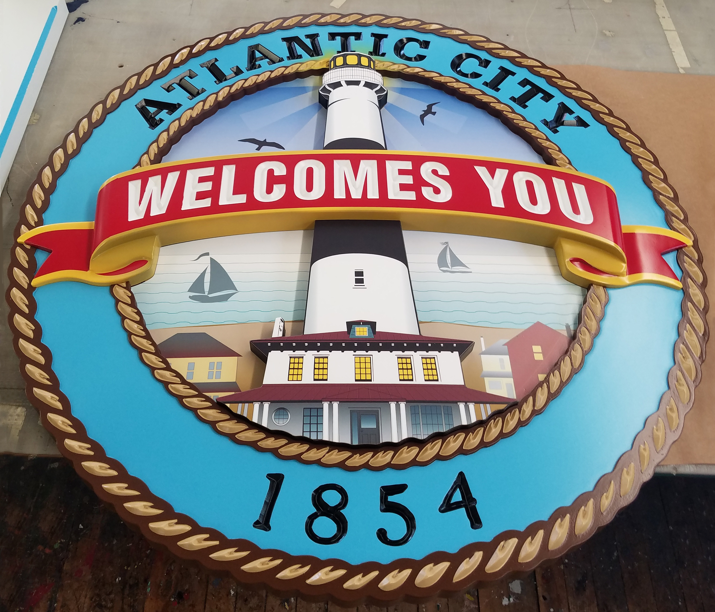 Atlantic City Welcomes You - Environmental Signage absecon art direction atlantic city banner beach blue community environmental signage lighthouse ocean outdoors red rope round sand sea signage summer teal welcome