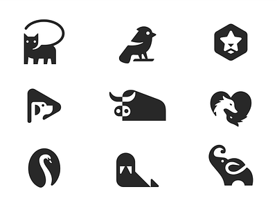 animal logos bird branding bull cat dog elephant forest lion logo negative space pet swan walrus wolf