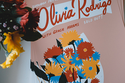 Olivia Rodrigo at WaMu Theater in Seattle concert flowers gracie abrams mid century midcentury olivia rodrigo poster seattle showbox