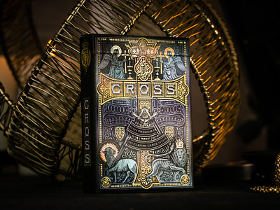 The Cross Golden Grace foiled edition bible cross design engraving etching illustration lamb line art lion packaging packaging design peter voth design playing cards riffle shuffle vector