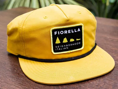 Pizza Slice Patch Hats for Fiorella Restaurant badge bay area branding california caps clothing custom fiorella gold graphic design italian logos merch patch hats san francisco slices street wear